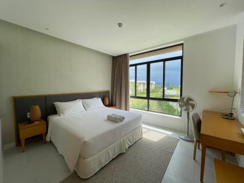 Кровать или кровати в номере Cam Ranh Villa