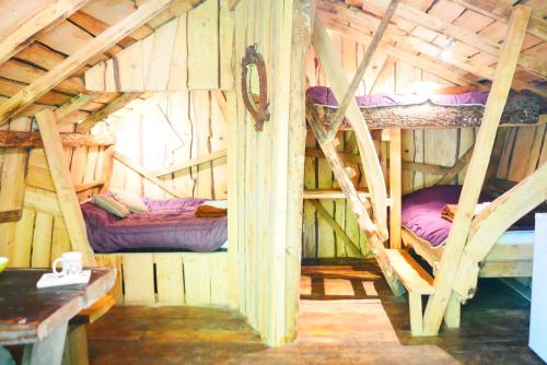 Ένα ή περισσότερα κρεβάτια σε δωμάτιο στο Camping Alsace Les Castors