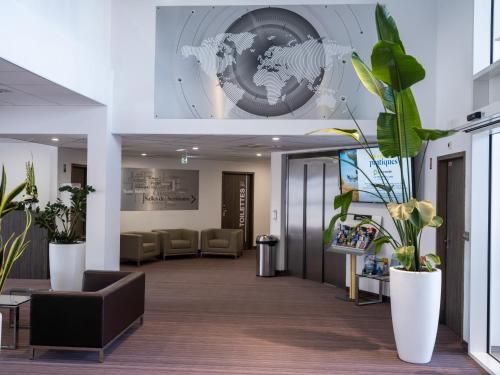 Posezení v ubytování Golden Tulip La Baule Hôtel et Résidence