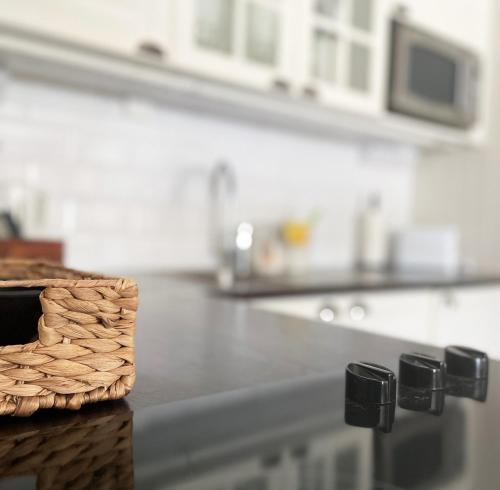 a kitchen counter with a basket on top of it at Holiday apartment in Storvik close to skiing and fishing in Storvik