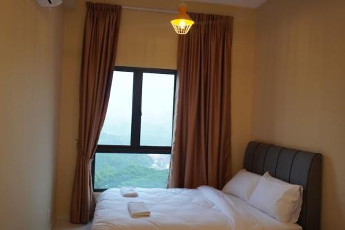 Postel nebo postele na pokoji v ubytování The Horizon Ipoh Infinity Pool 5 to 9pax