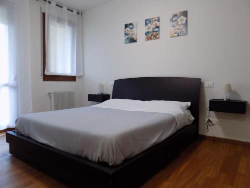 Katil atau katil-katil dalam bilik di spazioso mini appartamento