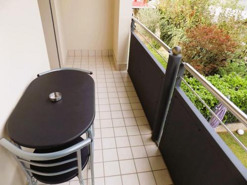 a bathroom with a toilet sitting on a balcony at spazioso mini appartamento in Pieve di Soligo