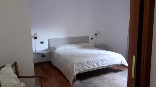 Een bed of bedden in een kamer bij lo Tsanty casa vacanza