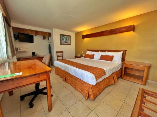 Postel nebo postele na pokoji v ubytování Best Western Riviera Tuxpan