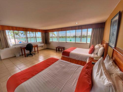 Postel nebo postele na pokoji v ubytování Best Western Riviera Tuxpan