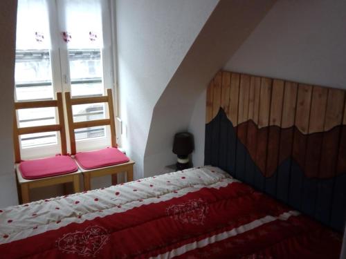 Кровать или кровати в номере Appartement Mont-Dore, 2 pièces, 4 personnes - FR-1-415-63
