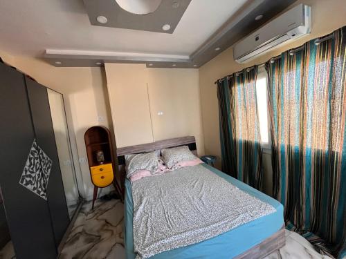 Кровать или кровати в номере Hurghada Apartment