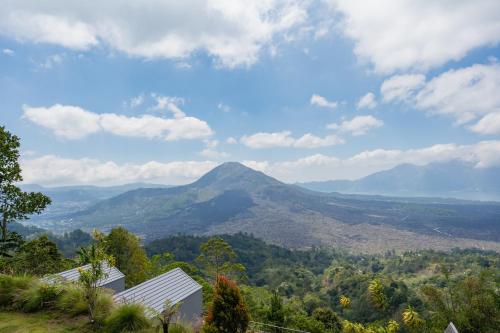 a view of a mountain from a house at Tegal Sari Cabin Kintamani in Kintamani
