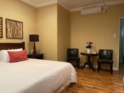 Katil atau katil-katil dalam bilik di Upper Room Guesthouse