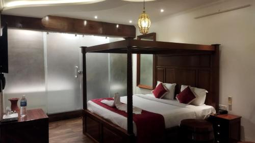 Cama ou camas em um quarto em Zoom Inn Heritage