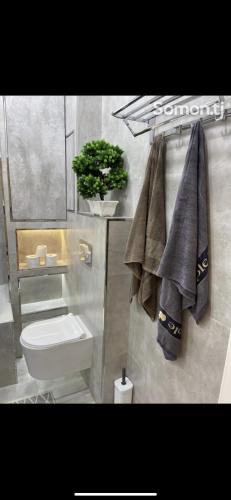 Koupelna v ubytování GMH Apartment Lux