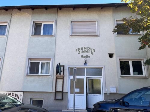 a building with the front door of a hotel at Beherbergungsbetrieb Madle in Deutsch Altenburg