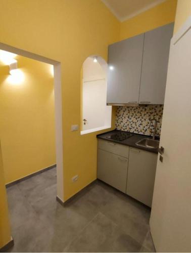 Η κουζίνα ή μικρή κουζίνα στο Stanza in Maggiore Rooms Bologna