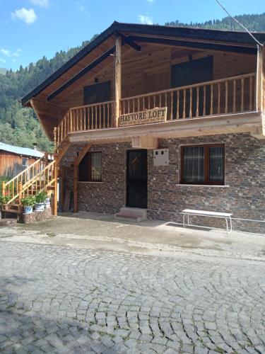 a building with a sign that reads ranger lodge at Nafkar Loft in Çamlıhemşin