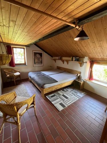 Un pat sau paturi într-o cameră la Ferienwohnung am Venn