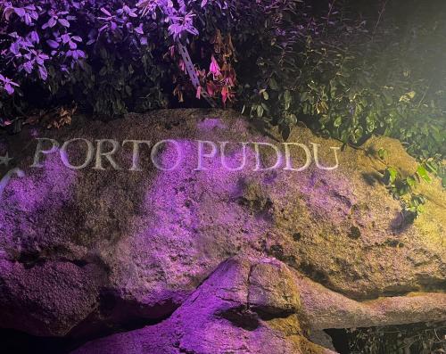 a rock with the word forbidden written on it at Hotel Porto Puddu - Il Nido dei Gabbiani in Porto Pollo