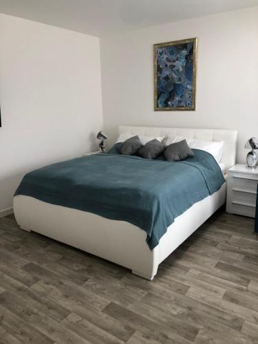 Кровать или кровати в номере Apartmán X28