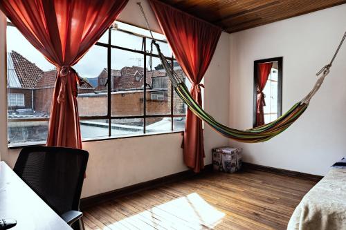 Postel nebo postele na pokoji v ubytování Casa en Bogotá ubicada en zona central