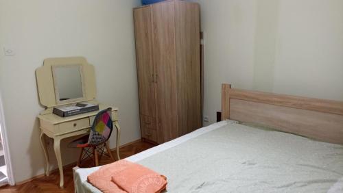 Postel nebo postele na pokoji v ubytování Jela Apartman