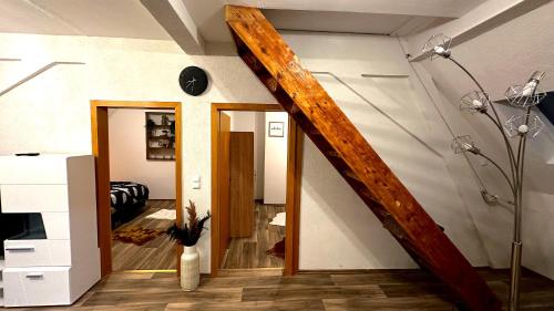 a stairway in a room with a stair case at Moderne Zentrale FeWo City Retreat in Bullay