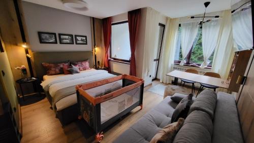 Postel nebo postele na pokoji v ubytování Pinewood ANG luxurious apartment A32