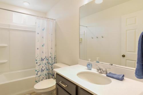 a bathroom with a sink and a toilet and a shower at 9 Mi to Airport Pet-Friendly Aurora Home with Deck in Aurora
