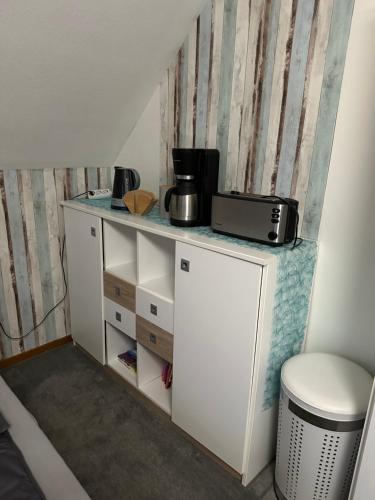 Kuchyň nebo kuchyňský kout v ubytování Gästezimmer „Ellmau“