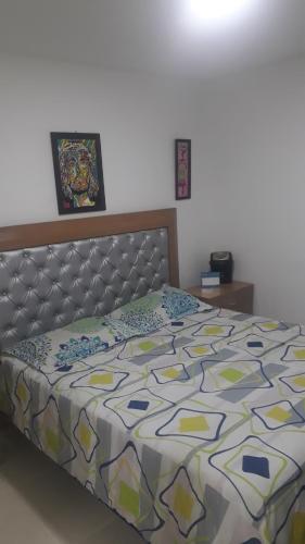 Ένα ή περισσότερα κρεβάτια σε δωμάτιο στο Casa de Andy vacacional Eje Cafetero