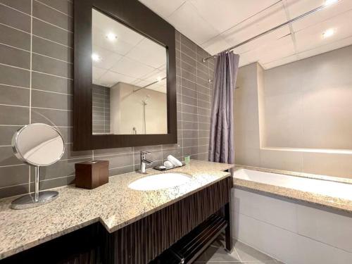 Koupelna v ubytování Dar Vacation - Spacious Seaview 2BR Apartment