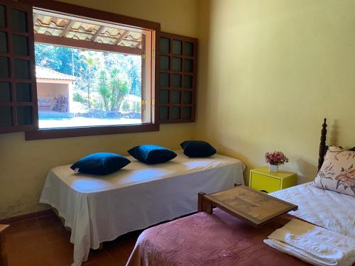 Katil atau katil-katil dalam bilik di Casa dos Coqueiros - Cama, Café e Eventos