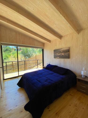 Postel nebo postele na pokoji v ubytování Cabañas Polikén
