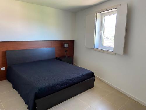 Postel nebo postele na pokoji v ubytování Casa das Portelas
