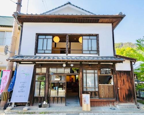 a building with a sign in front of it at CONNECT, - Vacation STAY 16929v in Arita