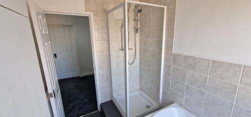 a bathroom with a shower and a toilet at APARTMENT IN CENTRAL BARNSLEY in Barnsley
