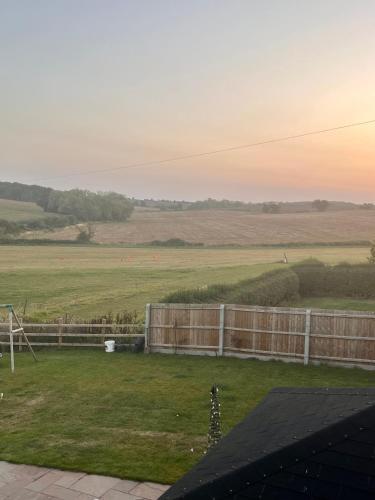 a view of a field from the roof of a house at The Honeysuckle Coop in Grantham