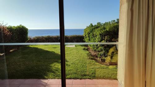 a view of the ocean from a window at Club Playa Blanca in Playa Blanca