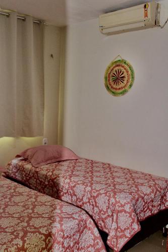 Ένα ή περισσότερα κρεβάτια σε δωμάτιο στο Casa para Temporada Lençóis Ville