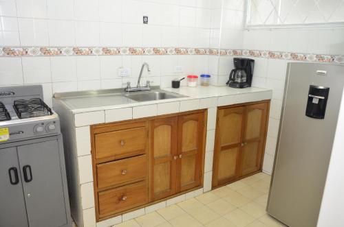 Virtuvė arba virtuvėlė apgyvendinimo įstaigoje Habitación sencilla o doble -2do nivel