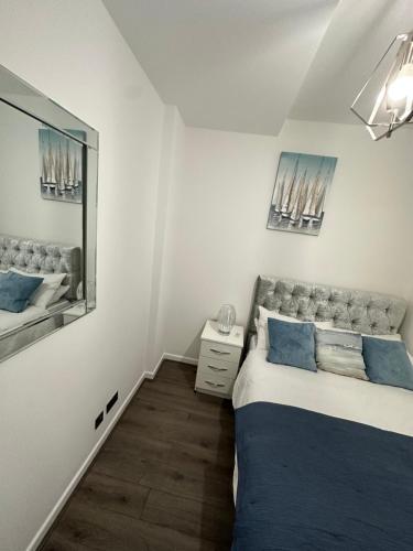 Ένα ή περισσότερα κρεβάτια σε δωμάτιο στο 2 bedroom flat close to Manchester City, Manchester City stadium and Coop Arena