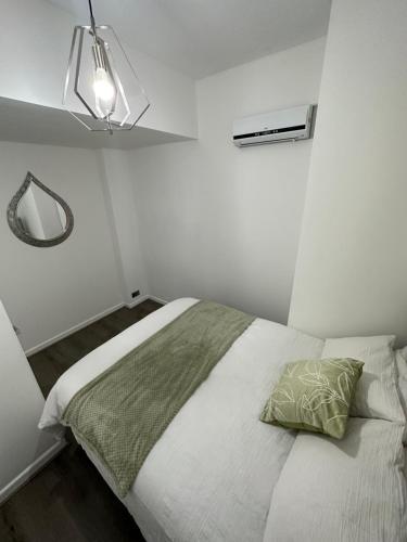 Ένα ή περισσότερα κρεβάτια σε δωμάτιο στο 2 bedroom flat close to Manchester City, Manchester City stadium and Coop Arena