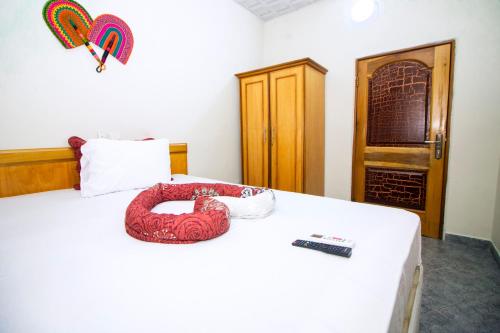 Postel nebo postele na pokoji v ubytování PRESTIGE Guesthouse ,Ksi