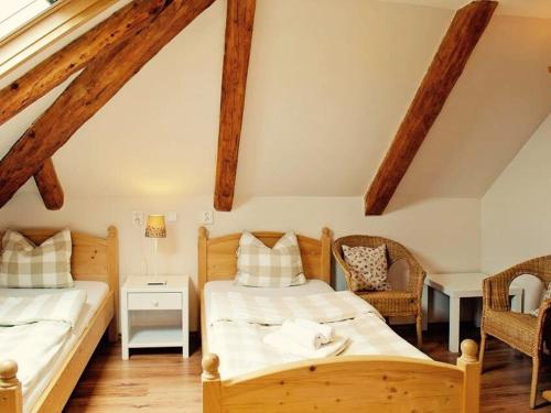 Postel nebo postele na pokoji v ubytování Garni Hotel St Anna