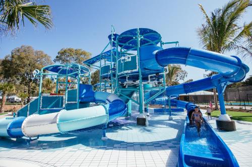 a blue water slide in a water park at BIG4 Sandstone Point Holiday Resort Bribie Island in Bongaree