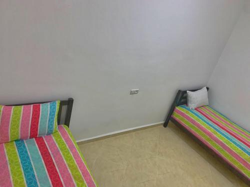 Katil atau katil-katil dalam bilik di Casa Ali