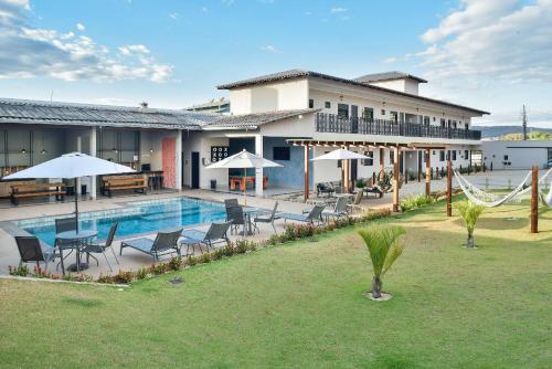 Kolam renang di atau dekat dengan Flat Charme do Cerrado - Até 4 pessoas/Cozinha/Ar Cond./Piscina