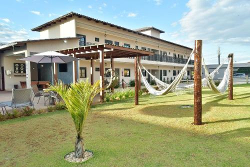 Taman di luar Flat Charme do Cerrado - Até 4 pessoas/Cozinha/Ar Cond./Piscina