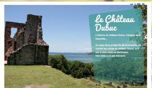a poster of an old building on top of a hill at Ananas Premium - Séjour Détente T2 Vue Mer avec Balcon Privé à Tartane in La Trinité