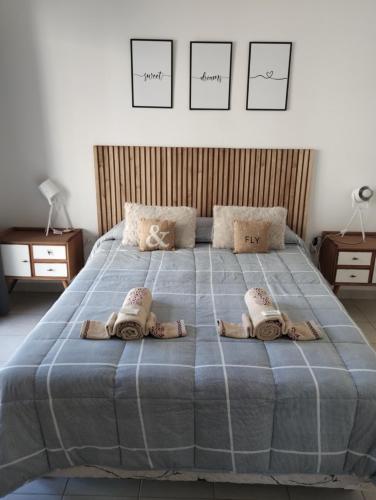 En eller flere senge i et værelse på Whales&beach II