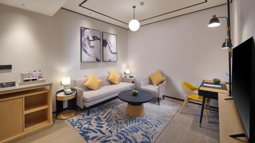 TV o dispositivi per l'intrattenimento presso Hilton Garden Inn Liaocheng Jiangbei Shuicheng